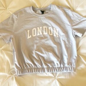 This is a wild fable, baby blue, cropped tee, in the size S.